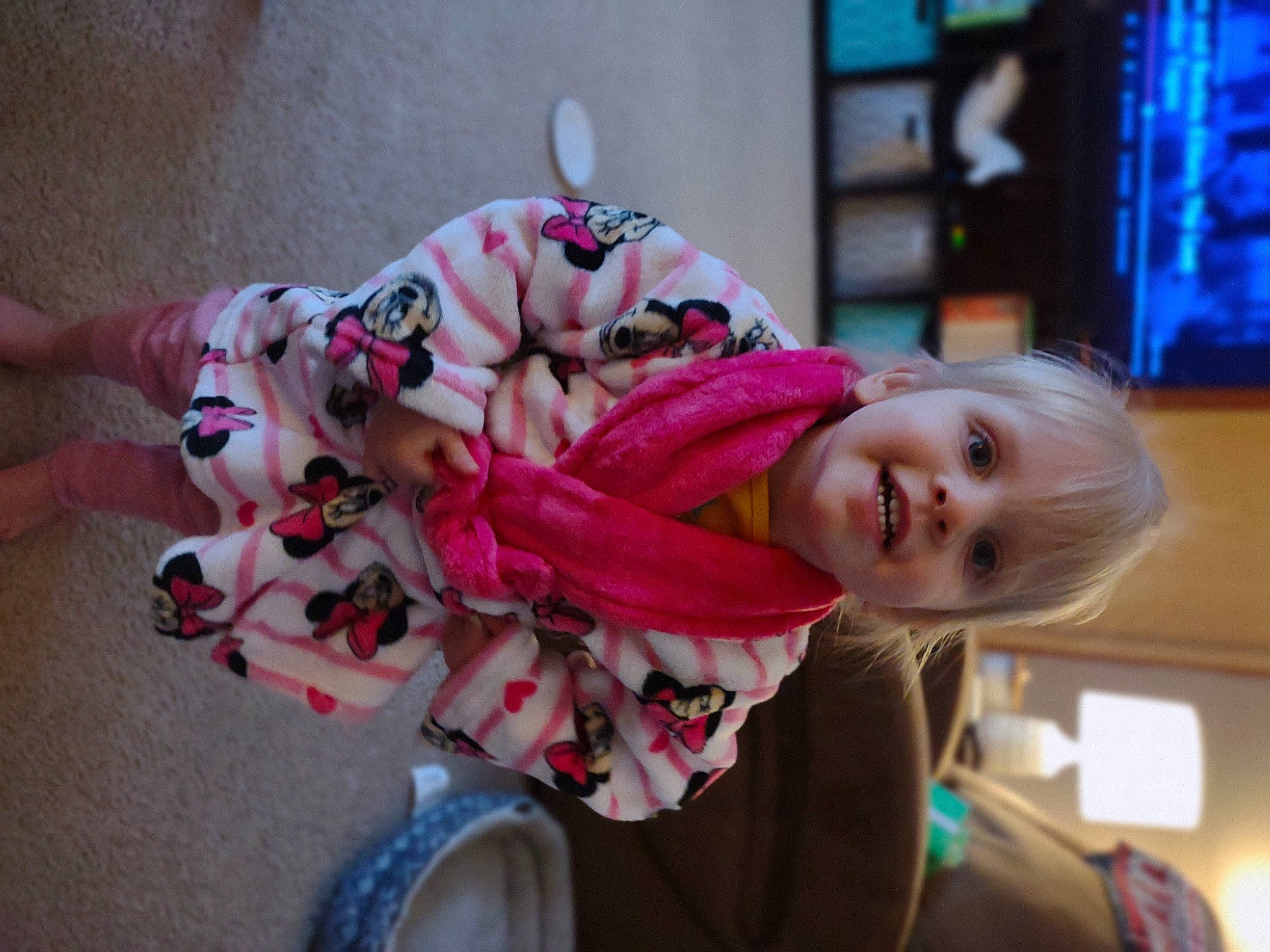 Josephine is registered to the contest to win money with this photo: baby, baby_products, child, flooring, fun, fur, happy, leisure, magenta, mammal, people, person, pink, room, sitting, smile, snapshot, television, toddler, tree