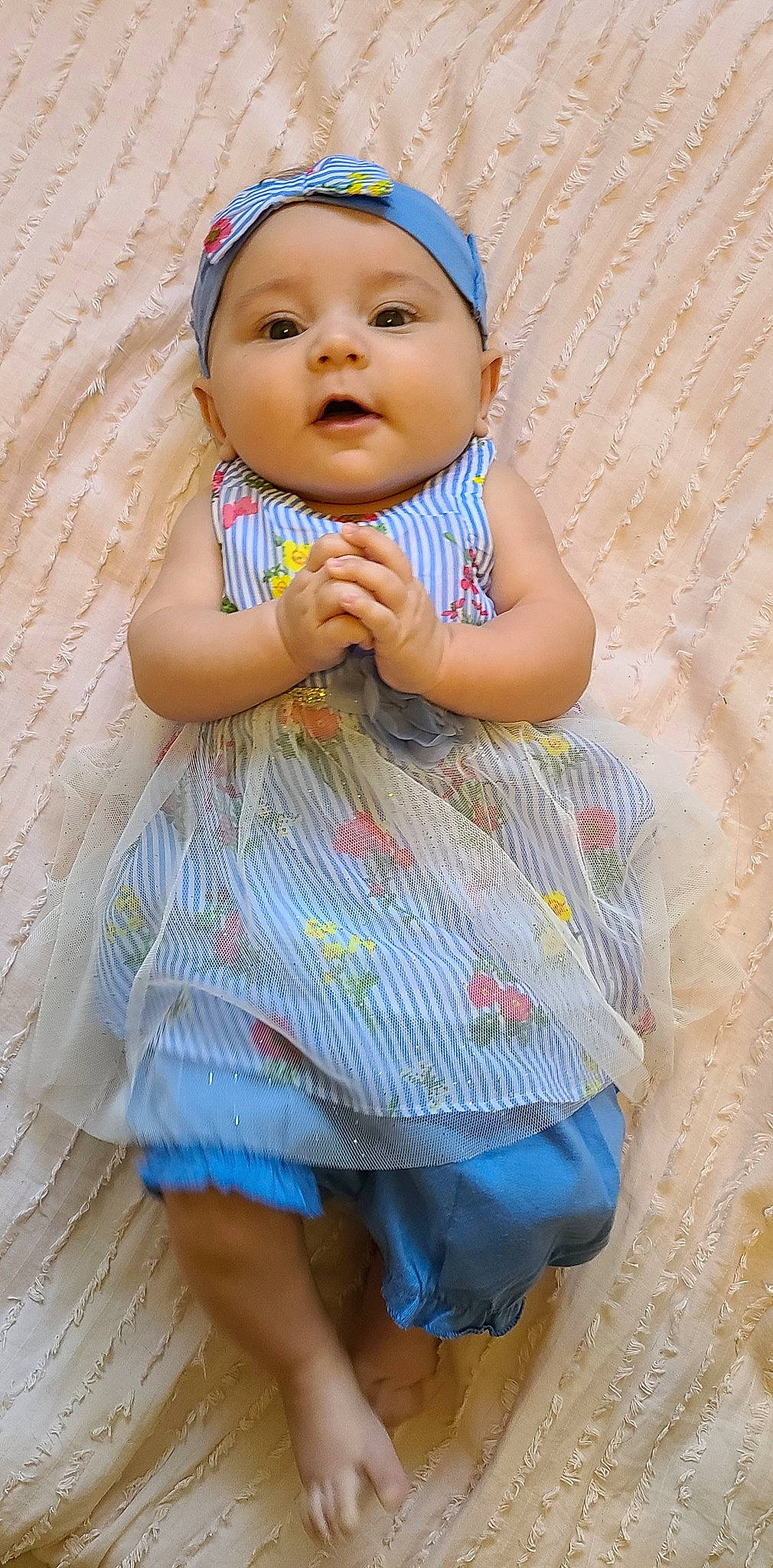 Laela joined the competition — help win amazing prizes! baby, baby_toddler_clothing, blue, cap, dress, eye, face, finger, happy, hat, headgear, headwear, iris, lip, person, pink, product, skin, sleeve, smile