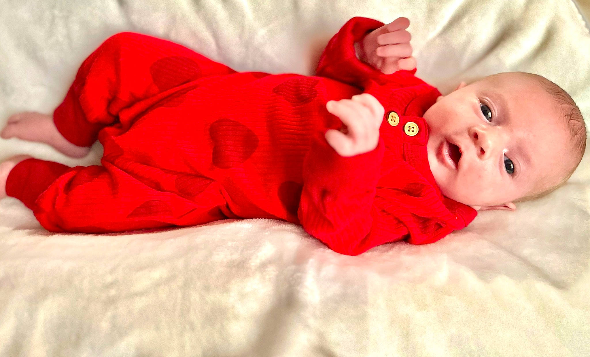 Saylor joined the competition — help win amazing prizes! baby, baby_toddler_clothing, carmine, child, comfort, flooring, fun, fur, happy, head, human_leg, linens, magenta, pattern, person, portrait_photography, room, sitting, sleeve, smile