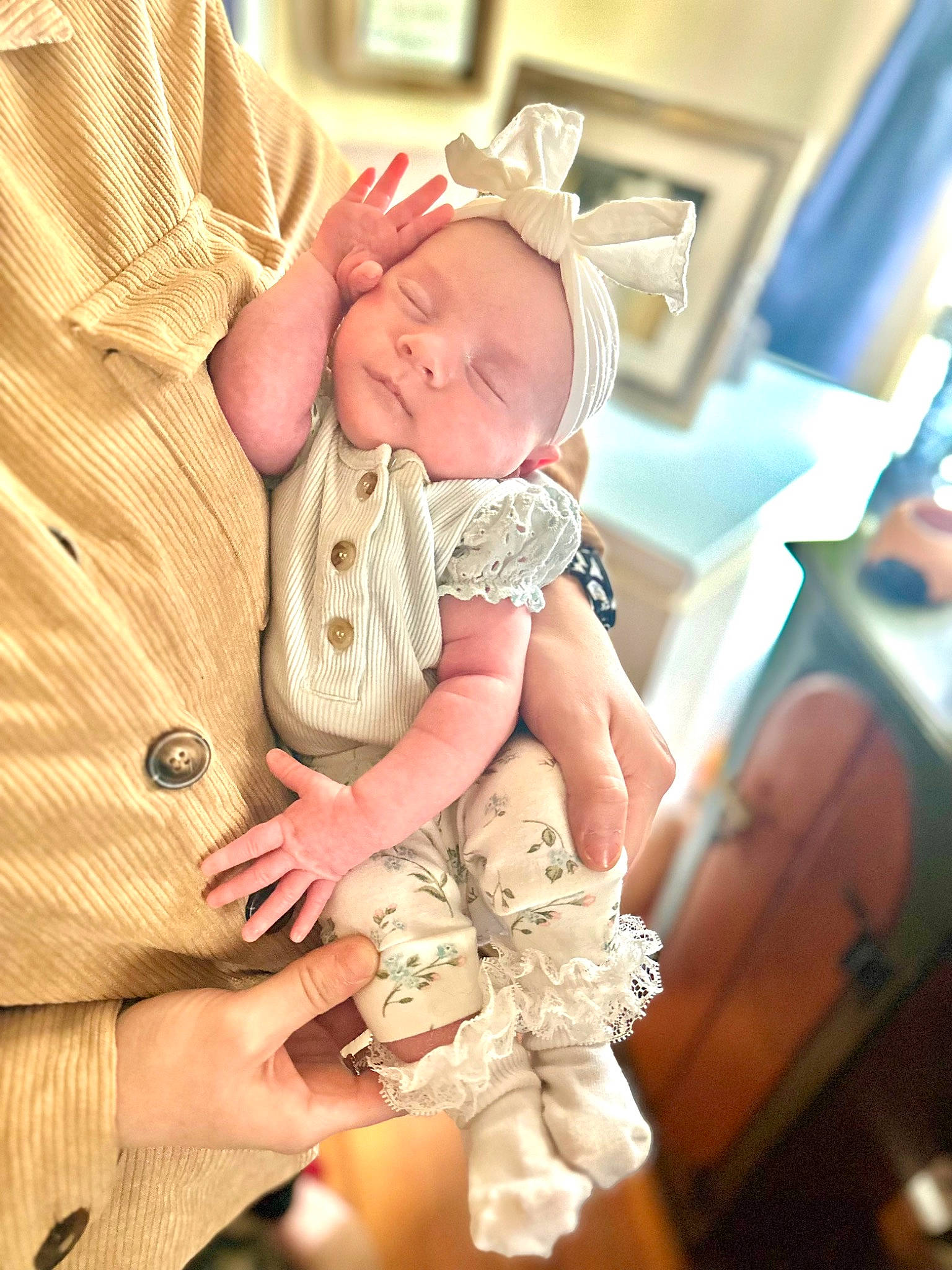 Saylor is registered to the contest to win money with this photo: baby, baby_products, baby_toddler_clothing, child, comfort, fashion_accessory, finger, hand, happy, hat, nail, pattern, peach, person, sitting, skin, sleeve, thumb, toddler, wood