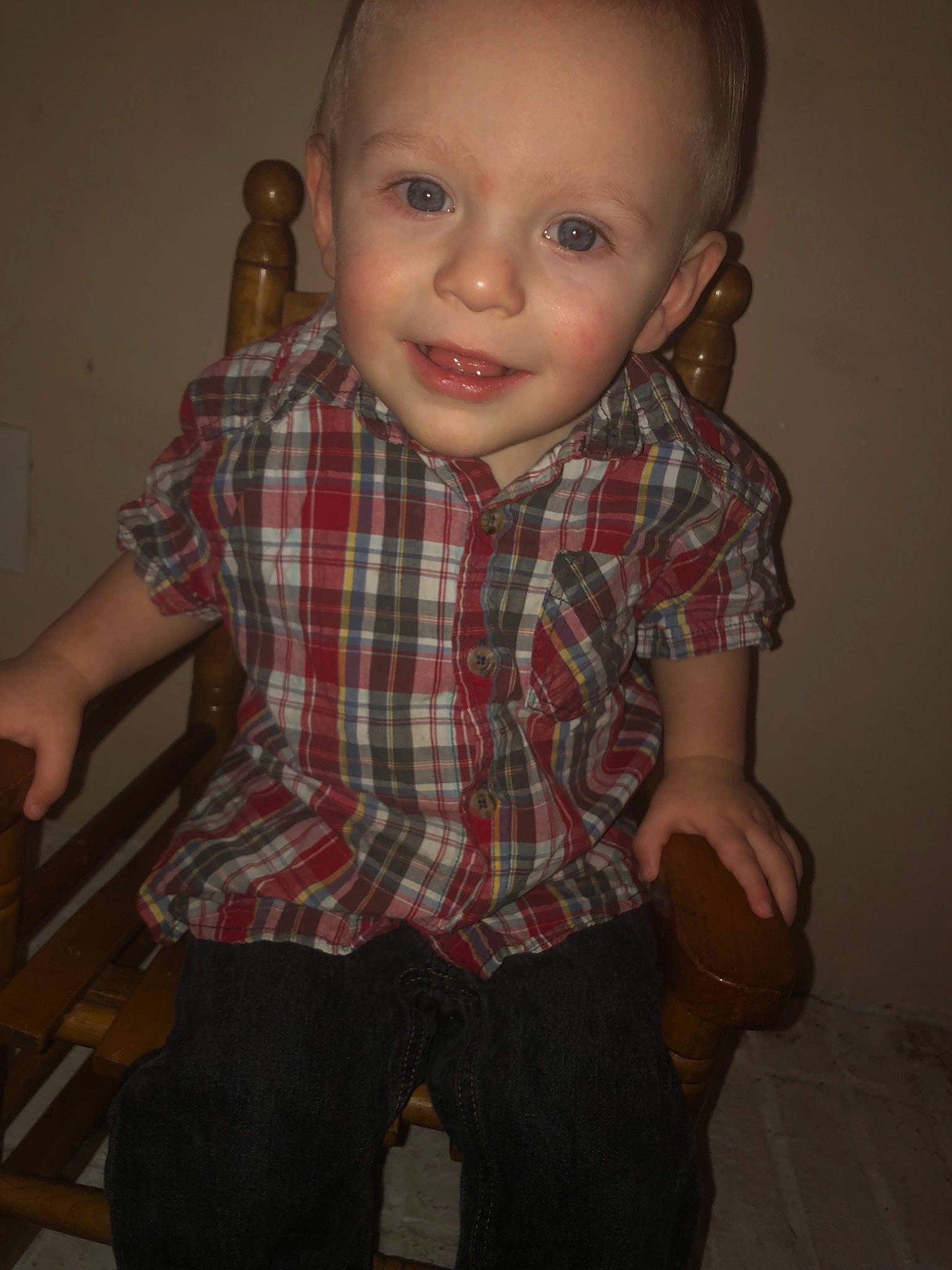 Donnie is registered to the contest to win money with this photo: baby, cheek, child, chin, design, eye, face, forehead, fun, head, iris, pattern, person, plaid, sitting, skin, sleeve, smile, standing, tartan