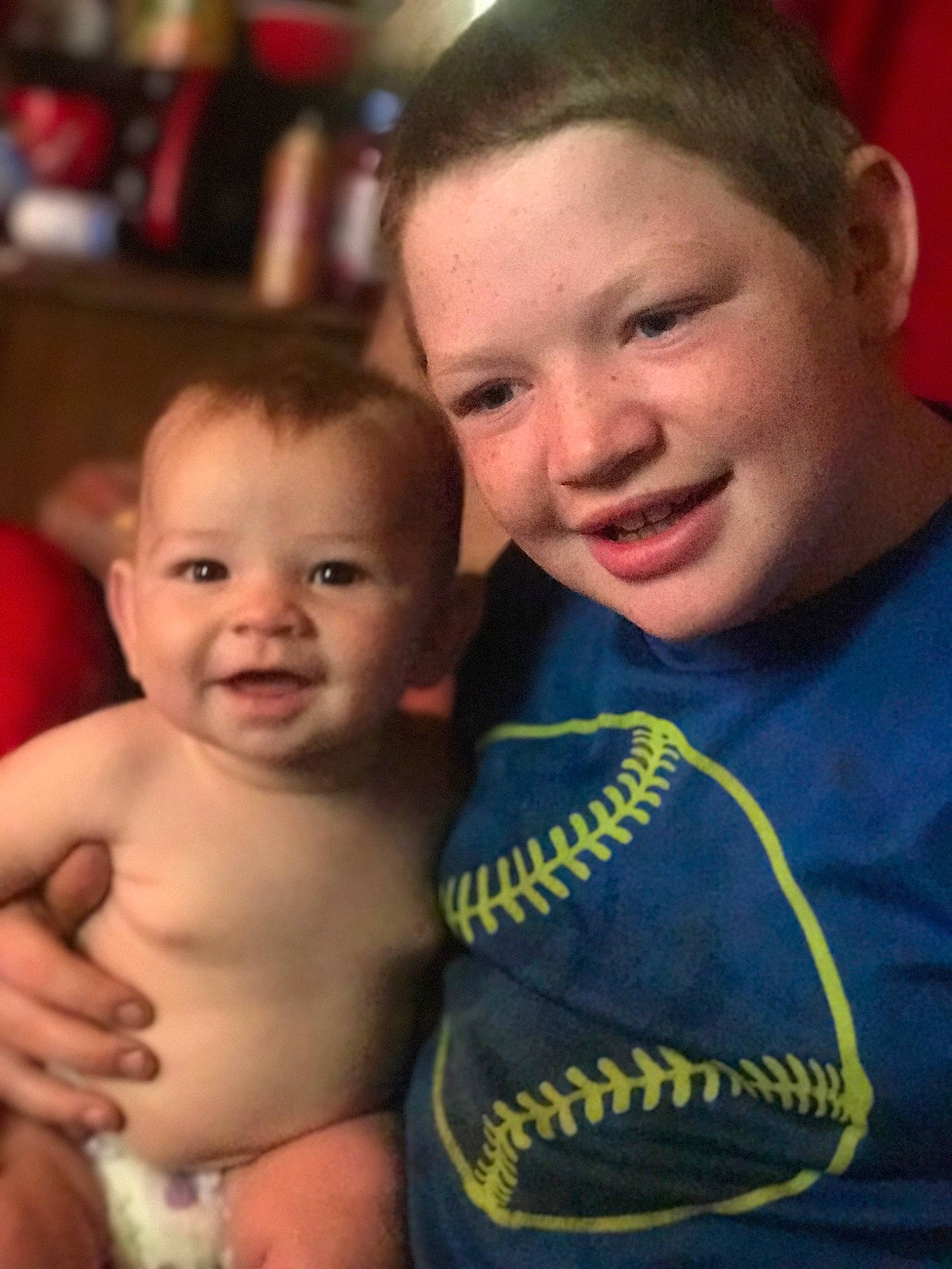 Diesel is registered to the contest to win money with this photo: arm, baby, cheek, child, eye, face, facial_expression, fun, happy, head, joy, laugh, muscle, people, person, sibling, skin, smile, toddler