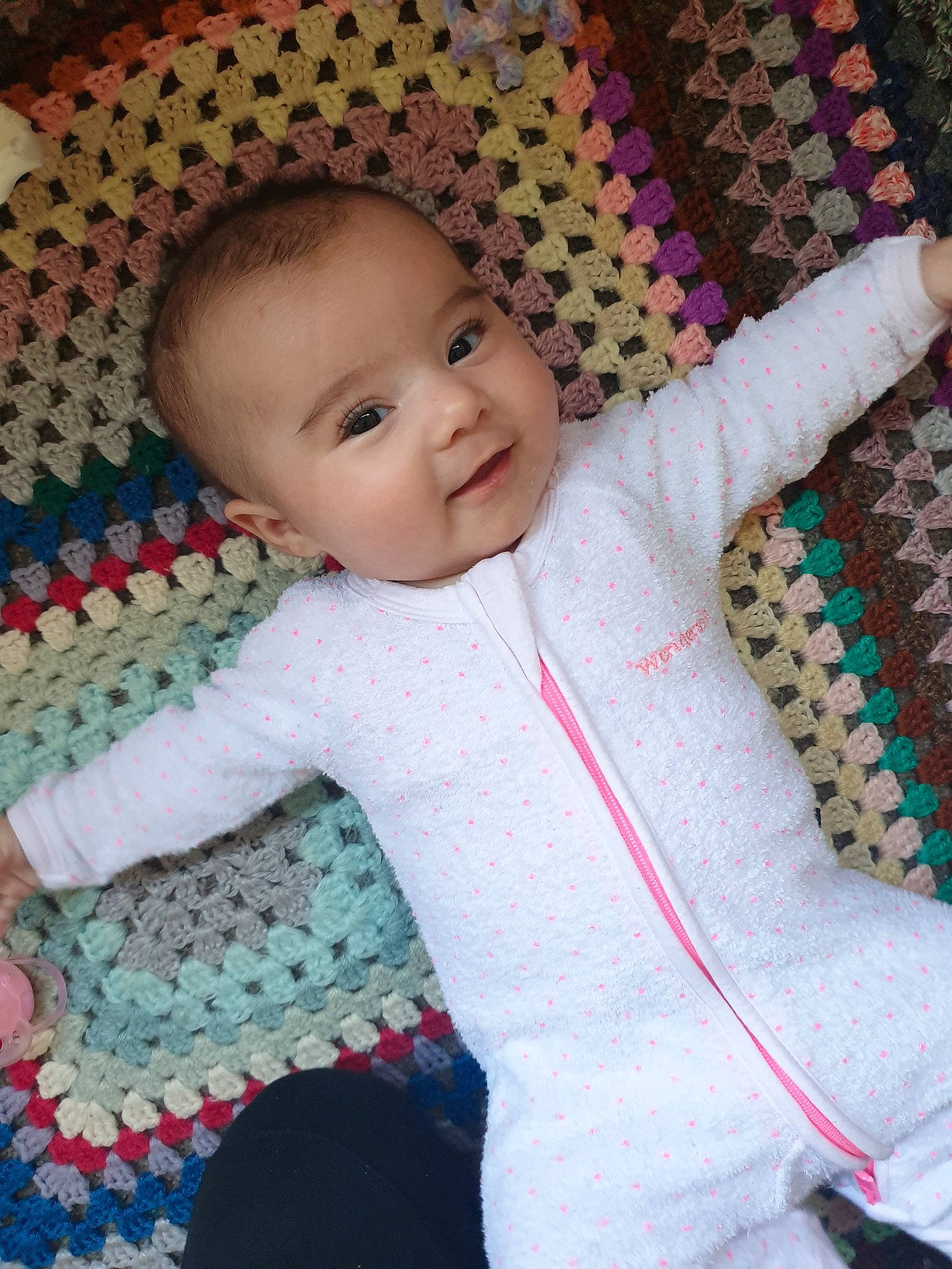 Layla is registered to the contest to win money with this photo: art, baby, blanket, cheek, child, craft, crochet, knitting, outerwear, pattern, person, skin, textile, toddler, wool, woolen