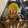 Bradley joined the competition — help win amazing prizes! baby, child, infant, smiling, laughing, green_hat, costume, monster_hat, crib, crib_rail, nursery, bedroom, pajamas, hands, portrait, indoors, baby_bedding, furniture, playful, happy