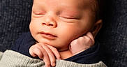 Javien joined the competition — help win amazing prizes! newborn, baby, sleeping, blanket, cozy, infant, face, peaceful, resting, hand, portrait, soft_lighting, indoors, wrapped, cute, child, cute_baby, toddler, closeup, warm