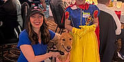 Evelyn joined the competition — help win amazing prizes! balloons, chairs, child, decorations, dog, dress, event, flooring, glasses, gloves, golden_retriever, happy, indoor, party, people, princess_costume, smile, table, tiara, woman