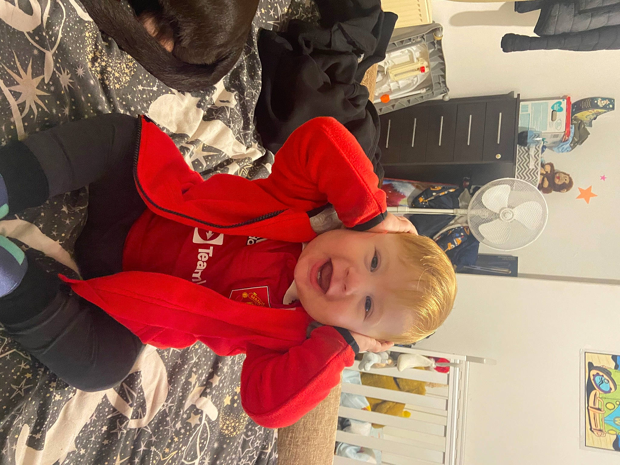 Brian is registered to the contest to win money with this photo: carmine, child, event, fun, happy, person, room, smile, toddler, tree, winter