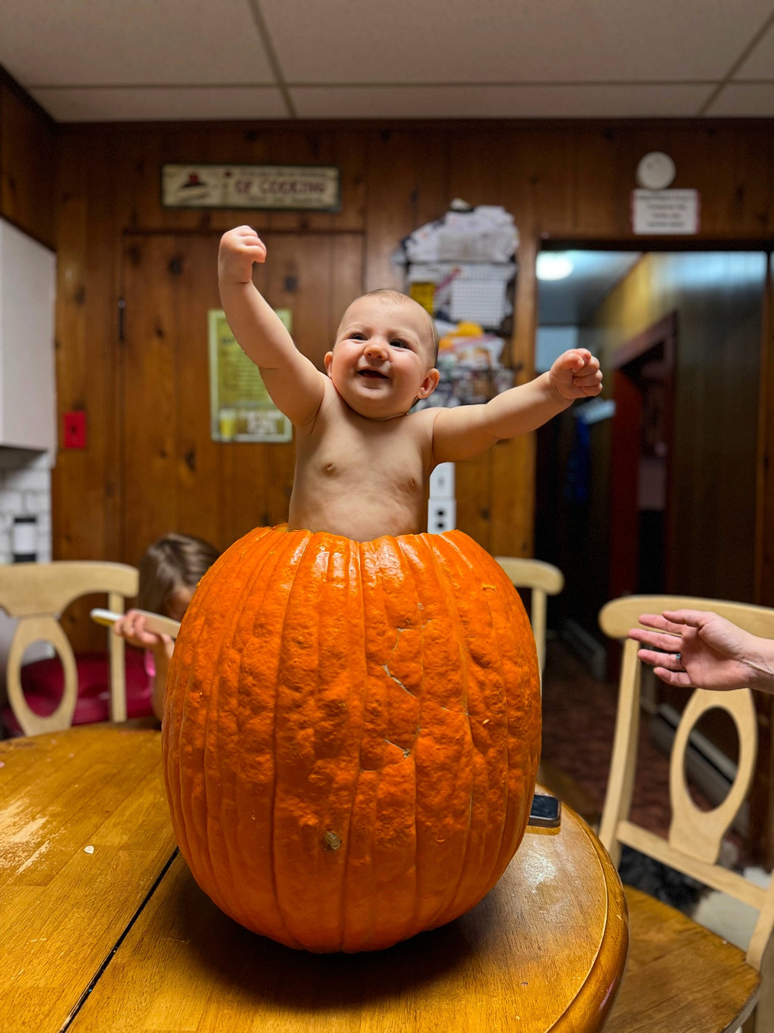 Ansleigh is registered to the contest to win money with this photo: art, artifact, calabaza, carving, clay, craft, creative_arts, cucurbita, flooring, gourd, jack_o_lantern, local_food, natural_foods, person, plant, pumpkin, smile, squash, vegetable, winter_squash