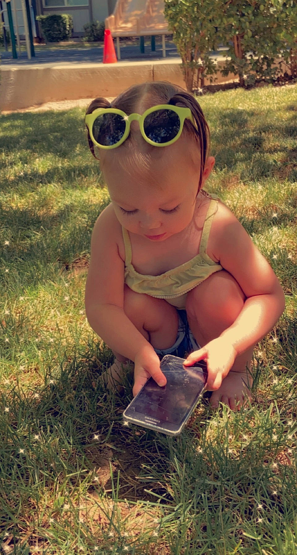 Delilah joined the competition — help win amazing prizes! baby, baby_toddler_clothing, child, eyewear, fun, goggles, grass, grass_family, happy, landscape, lawn, people_in_nature, person, personal_protective_equipment, plant, soil, sunglasses, sunlight, toddler, vision_care