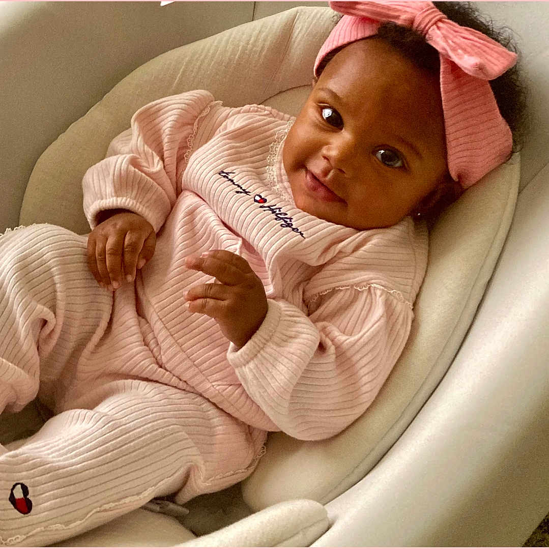 Autumn Eliana joined the competition — help win amazing prizes! baby, babylaughing, bed, bodypart, clothing, crib, face, finger, furniture, hand, happy, hat, head, homedecor, infantbed, newborn, person, photography, portrait, smile