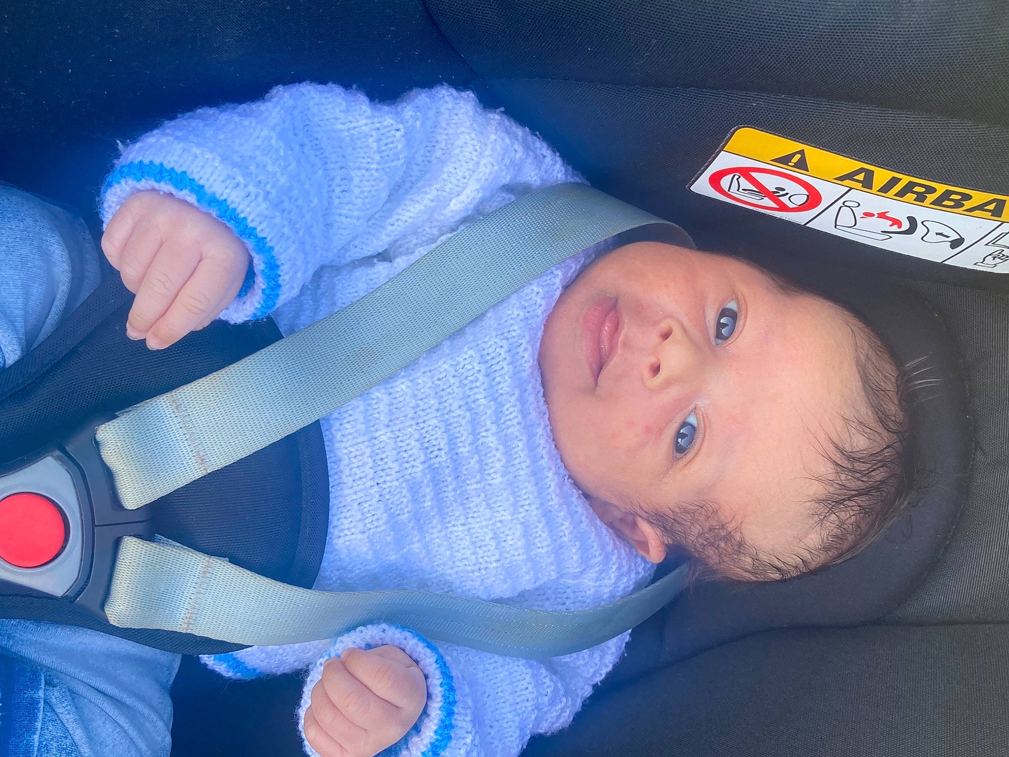 Hayden participe au concours pour gagner de l'argent avec cette photo : baby, baby_products, baby_safety, baby_sleeping, baby_toddler_clothing, blue, cheek, child, comfort, electric_blue, finger, lap, nail, nose, person, product, sleeve, textile, thumb, toddler