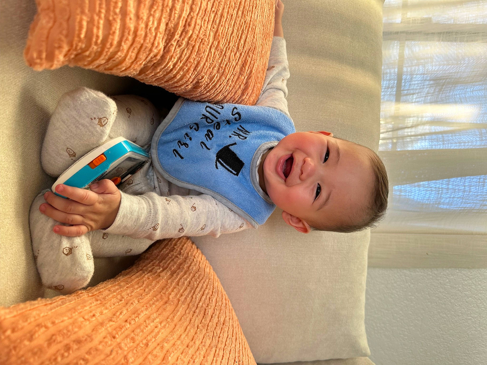 Camden joined the competition — help win amazing prizes! baby, baby_sleeping, baby_toddler_clothing, child, comfort, flooring, foot, happy, hardwood, headgear, joy, linens, pattern, person, room, sitting, skin, smile, textile, thumb