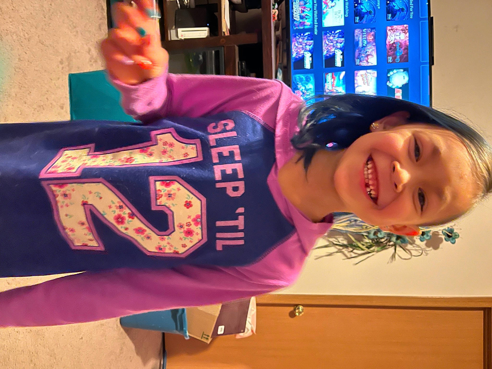 Abby joined the competition — help win amazing prizes! child, elbow, electric_blue, finger, fun, gesture, happy, jersey, joy, leisure, magenta, nail, person, play, sign_language, sleeve, smile, sportswear, t_shirt, thumb