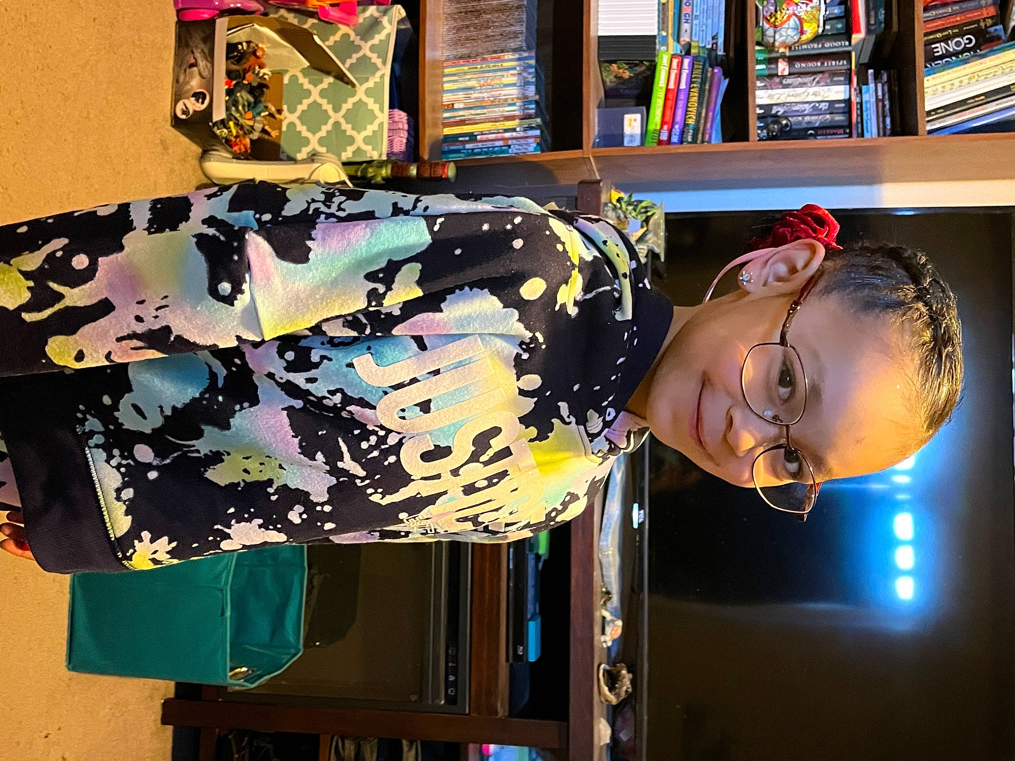 Abby joined the competition — help win amazing prizes! art, artist, bookcase, clothing, collection, cool, creative_arts, eyewear, fashion_design, fun, hairstyle, hat, joy, painting, pattern, person, publication, room, shelf, shelving