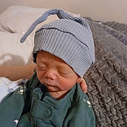 Asher joined the competition — help win amazing prizes! baby, newborn, hat, clothing, sleeping, infant, hand, blanket, bed, green, cute, soft, portrait, indoor, child, person, cozy, warm, comfort, resting