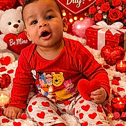 Nikko is registered to the contest to win money with this photo: baby, balloons, candle, celebration, child, cute, decorations, flowers, gift_box, heart, holiday, pajamas, plush_toy, red_clothing, roses, smiling, socks, teddy_bear, valentines_day, white_blanket