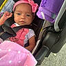 Jayda joined the competition — help win amazing prizes! baby, infant, car_seat, headband, pink, blanket, purple_blanket, clothing, straps, safety, cute, face, person, child, indoors, portrait, seatbelt, toddler, baby_girl, baby_accessory