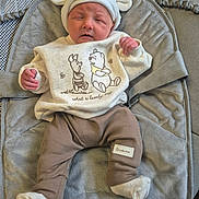 Jaxon joined the competition — help win amazing prizes! baby, infant, child, hat, clothing, sweater, pants, socks, seat, cushion, fabric, soft, cute, indoor, portrait, person, face, expression, newborn, cozy