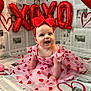 Koa is registered to the contest to win money with this photo: child, baby, infant, dress, bow, balloon, hearts, valentine, newspaper_background, sitting, smile, cute, portrait, indoor, celebration, party_decor, pink, red, tutu, headband