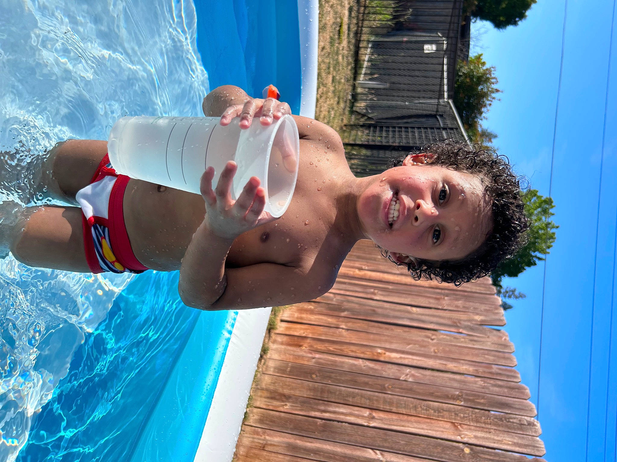 Josiah is registered to the contest to win money with this photo: arm, azure, blue, brassiere, chest, elbow, fun, happy, human_body, lake, leisure, muscle, person, recreation, sky, smile, summer, swimming_pool, swimwear, thigh