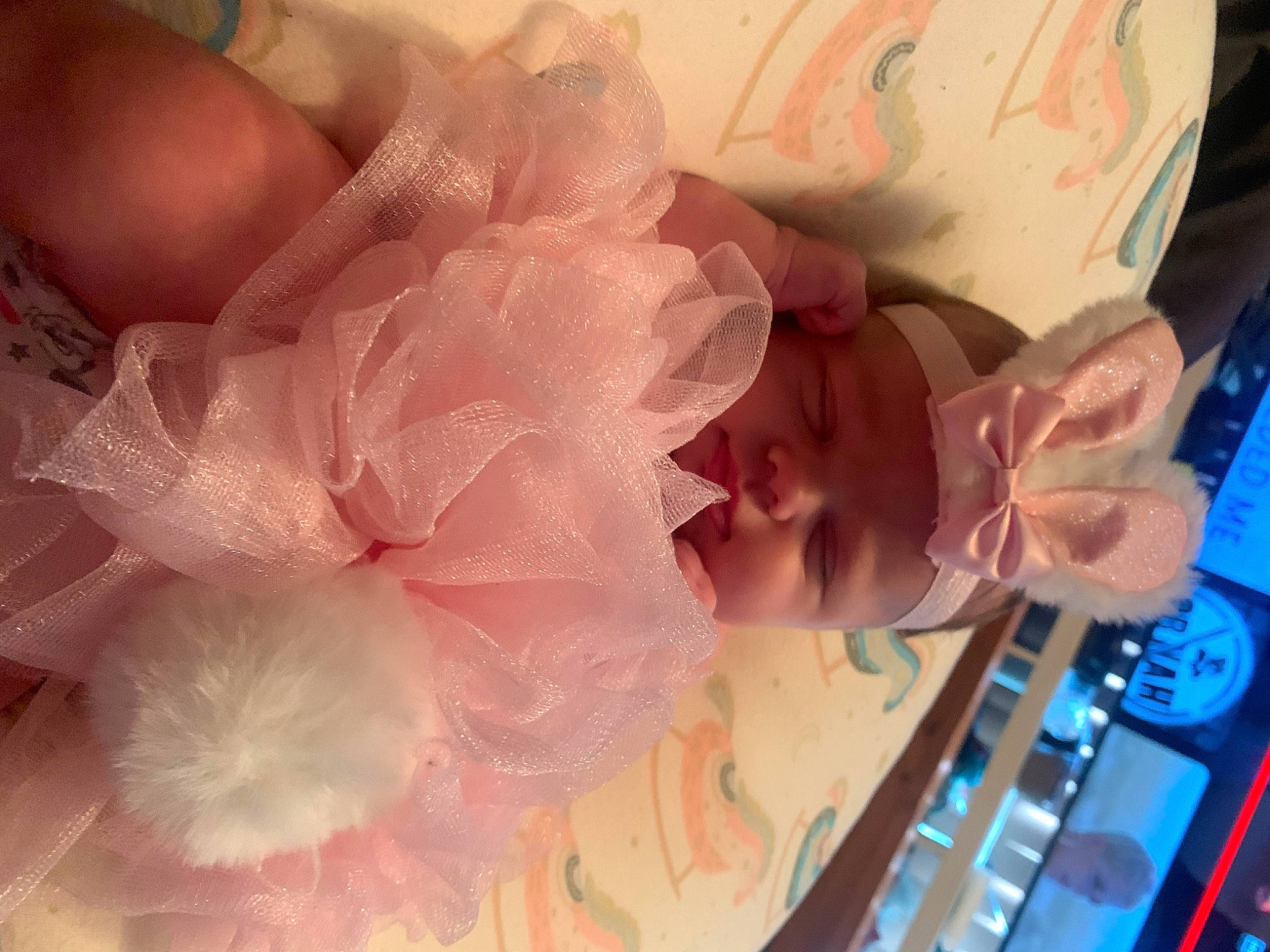 Ivy is registered to the contest to win money with this photo: baby, baby_products, child, cut_flowers, fashion_accessory, hair_accessory, hat, headwear, nail, peach, person, petal, pink, room, rose_family, rose_order, thumb, toddler, under_exposed