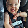 baby, child, smiling, car_seat, seatbelt, polka_dot, hat, happy, infant, cute, safety, straps, closeup, skin, face, tongue, clothing, car, transportation, young
