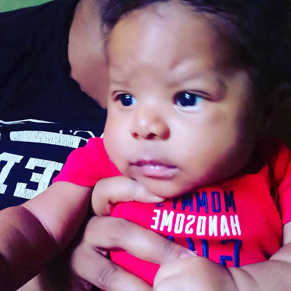 Alijah is registered to the contest to win money with this photo: beauty, cheek, child, chin, cool, ear, eye, eyebrow, face, finger, forehead, hand, infant, lip, mouth, nose, person, pink, product, skin