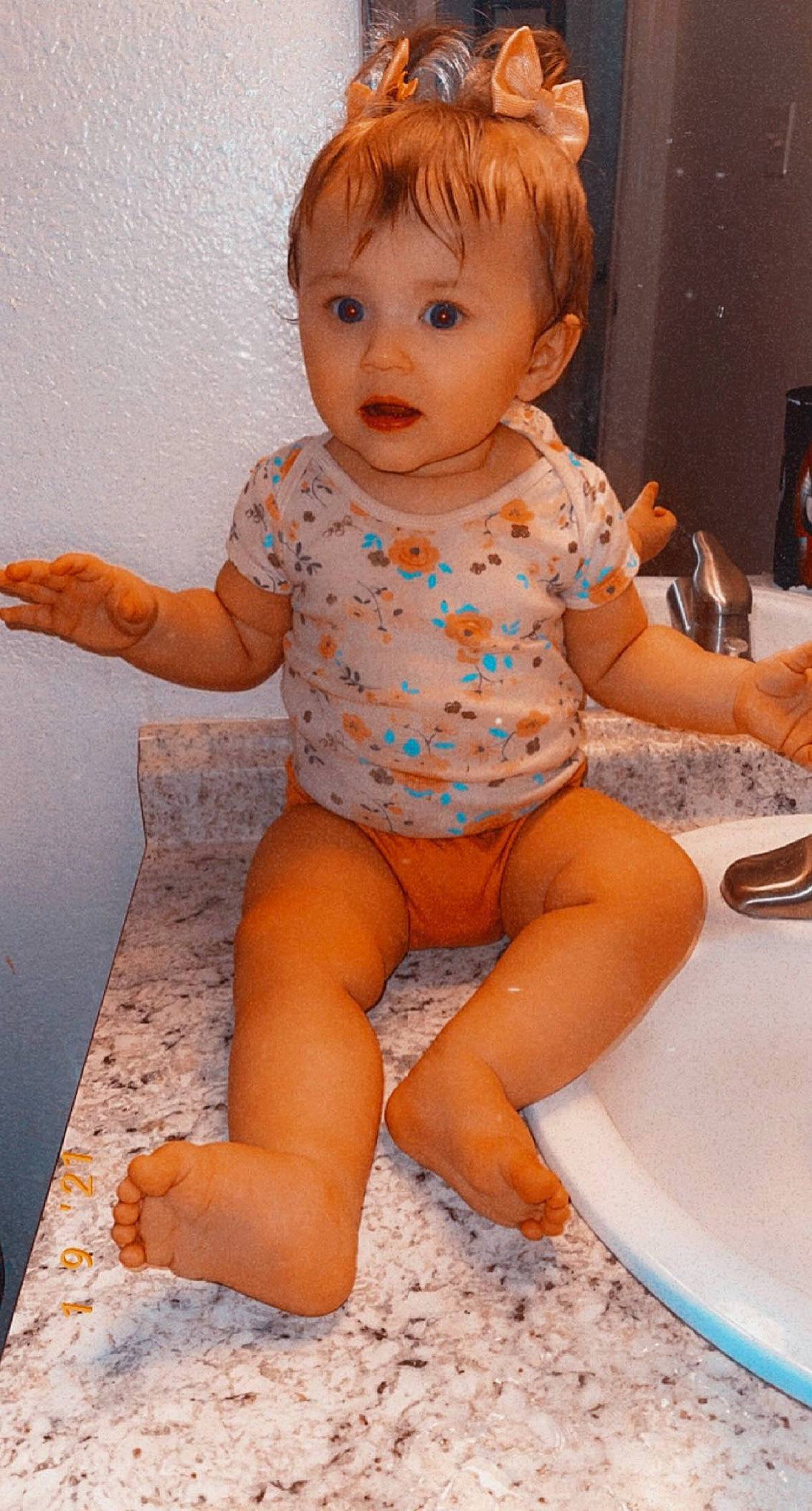 Ariella is registered to the contest to win money with this photo: baby_toddler_clothing, cheek, eye, face, hairstyle, head, human_body, joint, leg, lip, mouth, muscle, neck, organ, person, shorts, shoulder, skin, sleeve, surprise