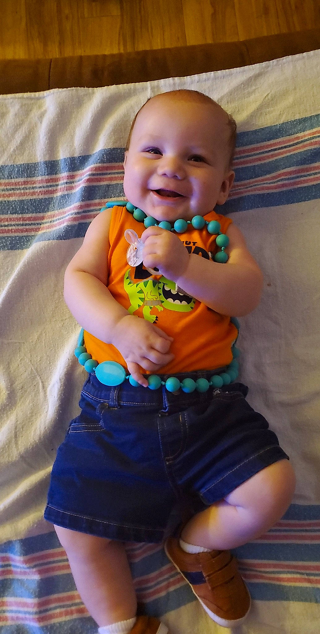 Kendrick is registered to the contest to win money with this photo: abdomen, baby, cheek, child, fun, joy, person, play, sitting, skin, smile, thigh, toddler