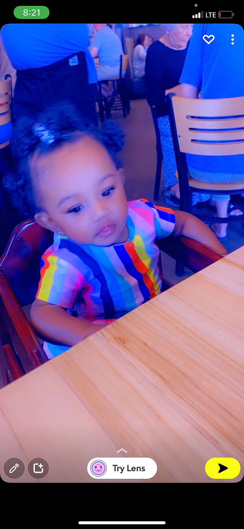 Eryn is registered to the contest to win money with this photo: azure, blue, chair, child, desk, electric_blue, event, fun, furniture, leisure, magenta, night, person, purple, room, sitting, t_shirt, table, toddler, vacation