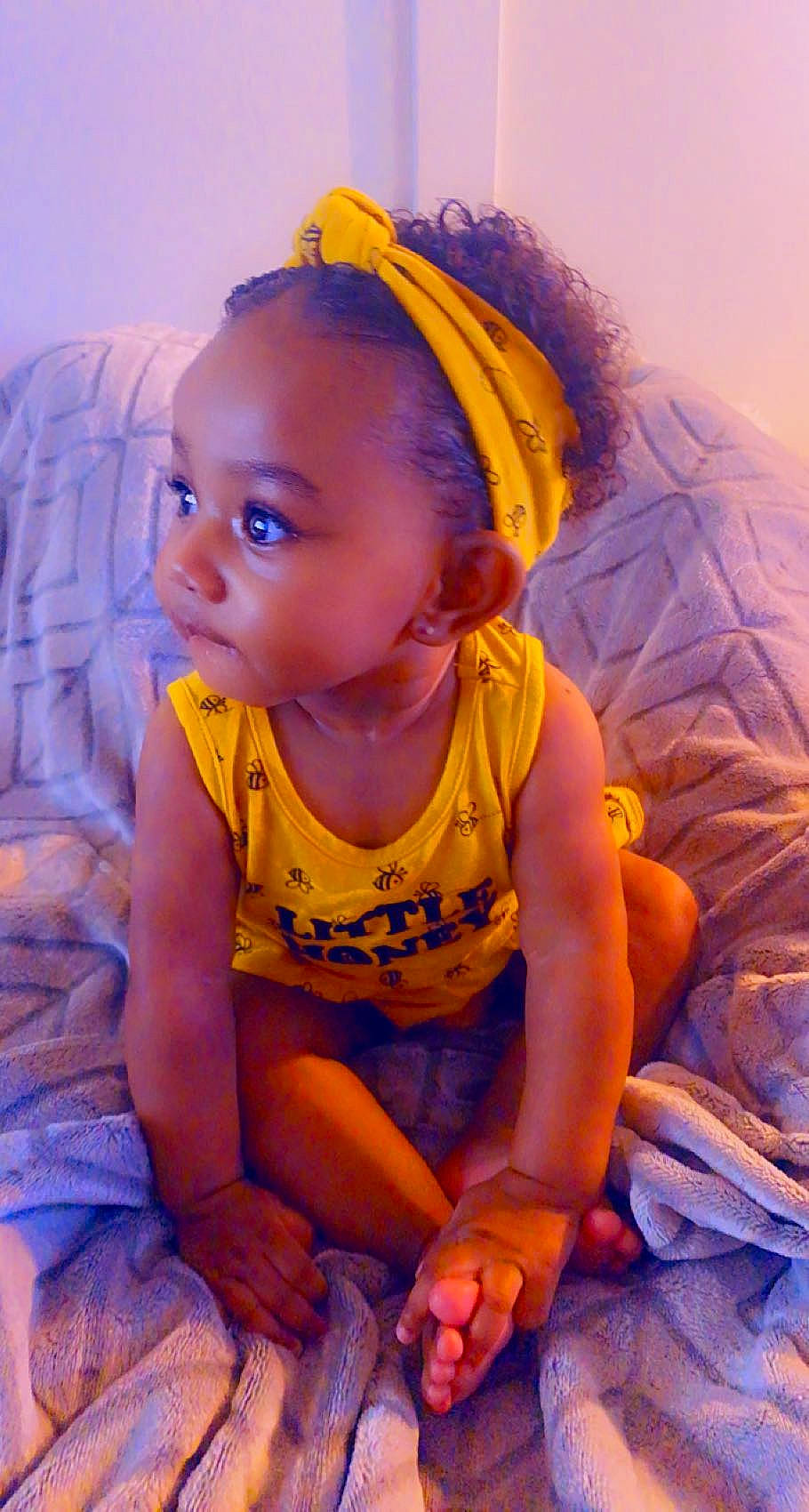 Eryn is registered to the contest to win money with this photo: baby_toddler_clothing, child, dress, electric_blue, eye, flash_photography, fun, happy, head, human_body, iris, leisure, orange, person, pink, purple, recreation, sitting, skin, toddler