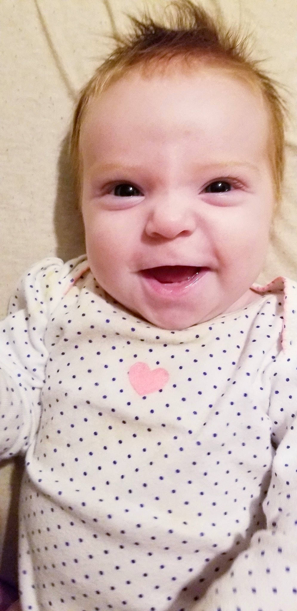 Elizabeth Grace is registered to the contest to win money with this photo: baby, cheek, child, chin, design, eye, face, facial_expression, forehead, head, iris, lip, mouth, nose, pattern, person, pink, polka_dot, skin, smile