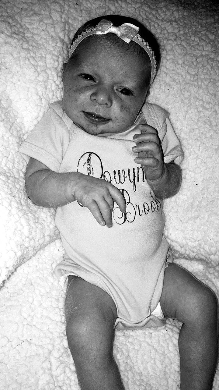 Rowyn joined the competition — help win amazing prizes! arm, baby, black, black_and_white, cheek, child, face, facial_expression, head, monochrome, monochrome_photography, people, person, photograph, skin, smile, snapshot, standing, t_shirt, toddler