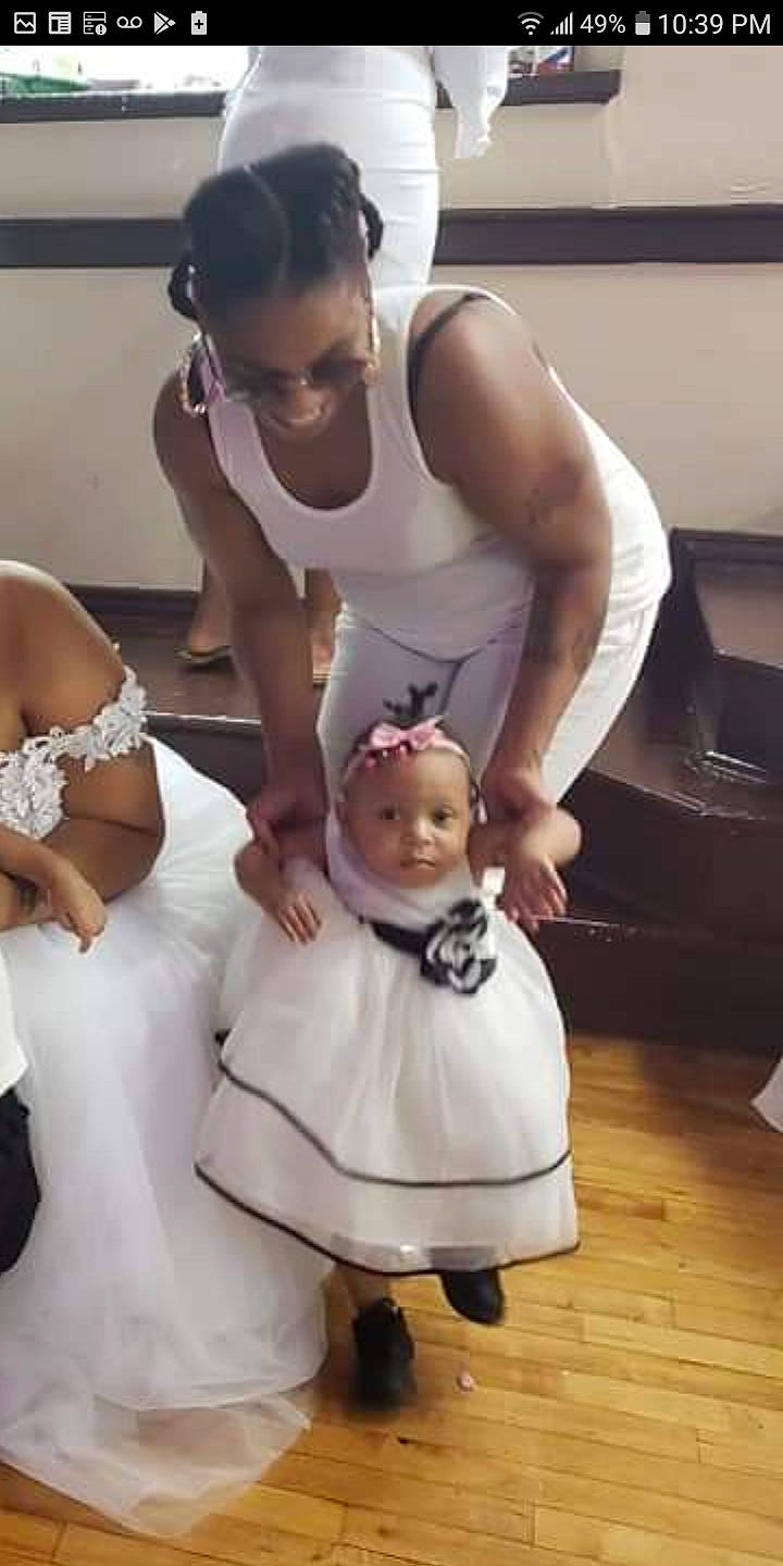 Dakota Wade is registered to the contest to win money with this photo: baby, ceremony, child, hairstyle, neck, person, toddler