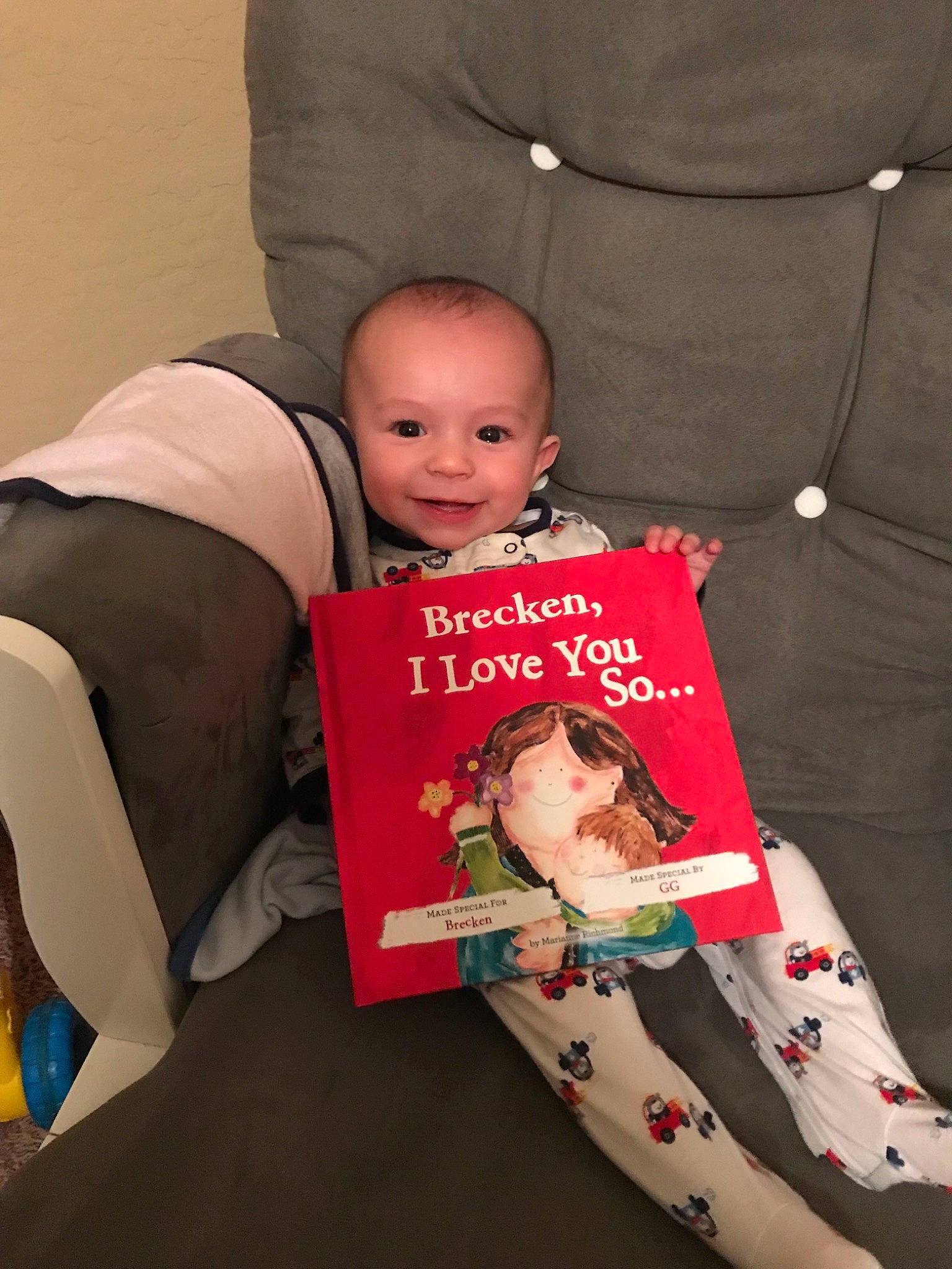 Brecken is registered to the contest to win money with this photo: arm, child, day, infant, lap, person, product, sitting, textile, toddler
