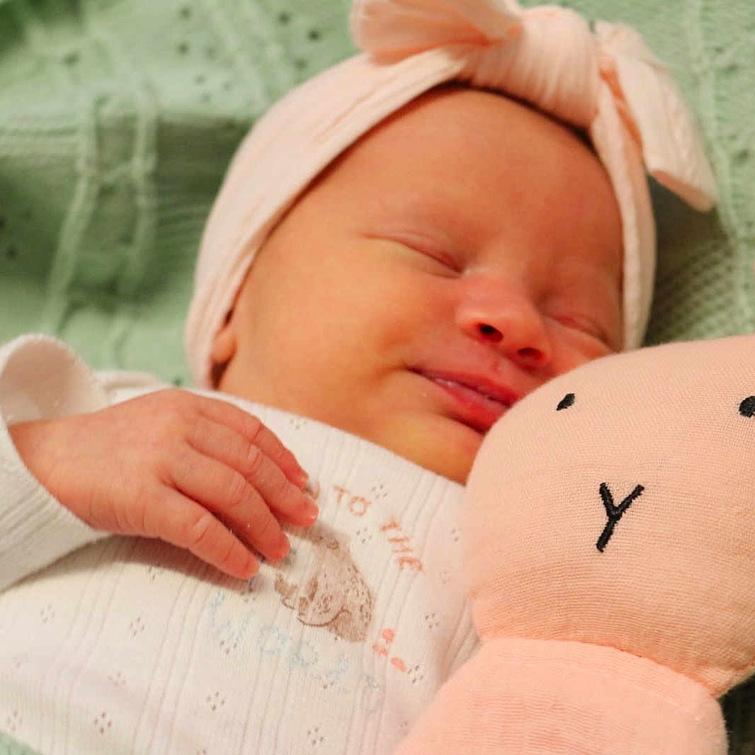 Madelyne joined the competition — help win amazing prizes! baby, blanket, bunny, child, comfort, cozy, cute, fabric, hand, headband, indoors, infant, knitted, newborn, peaceful, plush_toy, portrait, rest, sleeping, soft_toy
