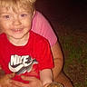 adult_hands, animal, casual_clothing, child, cute, flash_photo, grass, happy, holding, human, nature, night, nike_logo, outdoor, person, portrait, red_shirt, smiling, turtle, young_child