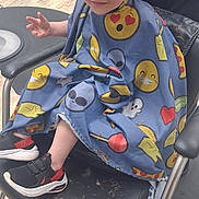 Ryder joined the competition — help win amazing prizes! toddler, child, haircut, barber_chair, stylist, hair, mohawk, cape, emoji, footwear, sneakers, floor, salon, hands, person, hairstyle, smiling, indoor, seat, cute