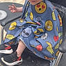 toddler, child, haircut, barber_chair, stylist, hair, mohawk, cape, emoji, footwear, sneakers, floor, salon, hands, person, hairstyle, smiling, indoor, seat, cute