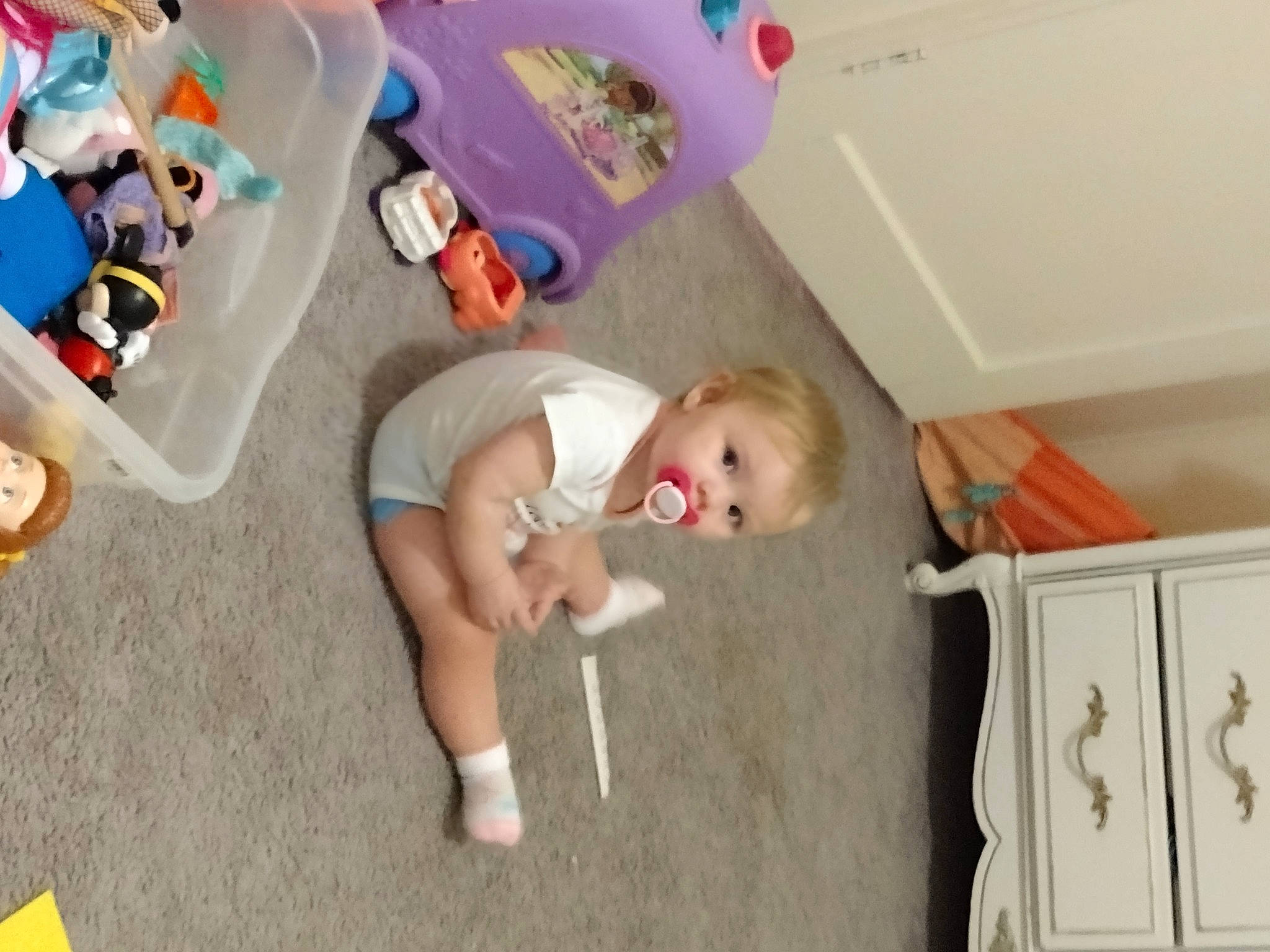 Prestyn is registered to the contest to win money with this photo: baby, baby_products, baby_toddler_clothing, baby_toys, child, comfort, floor, flooring, fun, hardwood, infant_bed, leg, leisure, person, plastic, play, room, sitting, toddler, toy