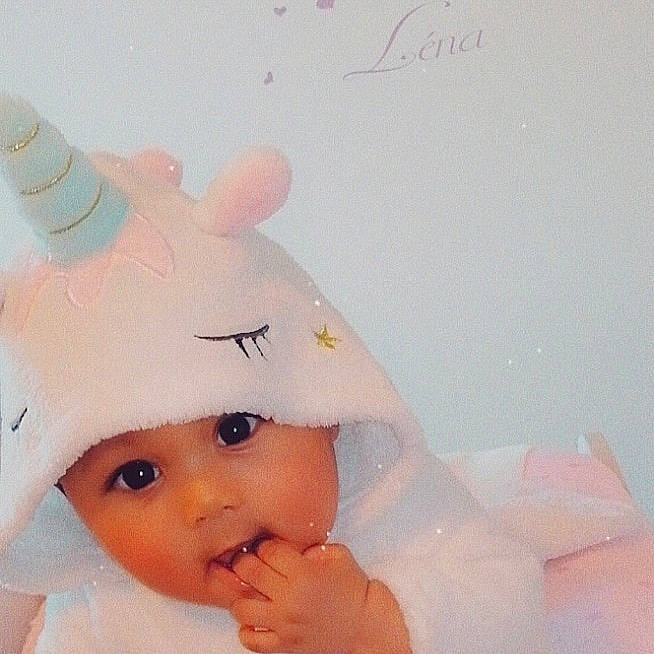 Lena a rejoint le concours — aidez-le/la à gagner de superbes lots ! baby, child, ear, fictional_character, head, headgear, headwear, illustration, person, pink, product, skin, toddler, toy, white, yellow