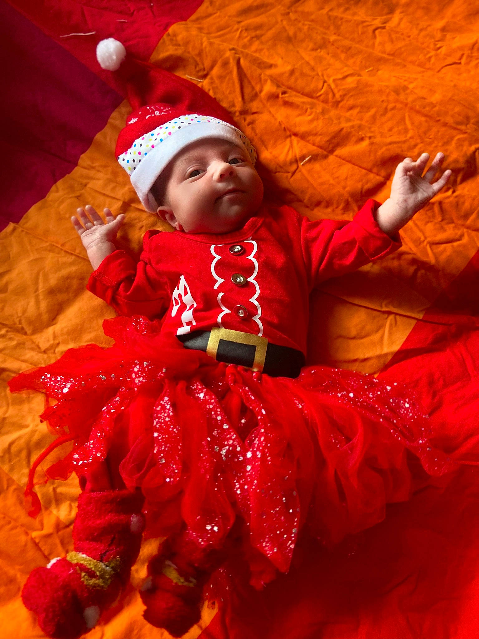 Noémie a rejoint le concours — aidez-le/la à gagner de superbes lots ! baby, baby_toddler_clothing, beauty, cap, costume_hat, embellishment, event, face, facial_expression, fun, happy, headgear, holiday, human, magenta, person, pink, red, textile, toddler