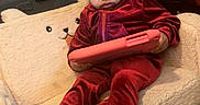 Camila joined the competition — help win amazing prizes! baby, child, curly_hair, cushion, digital_device, focused, hair_bows, indoors, playroom, portrait, red_outfit, relaxed, sitting, tablet, teddy_bear, toddler, toy, toy_truck, velvet, winnie_the_pooh