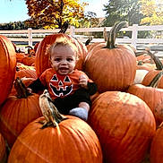 Kashton joined the competition — help win amazing prizes! adult, baby, face, festival, food, fruit, halloween, happy, head, male, man, pear, person, photography, plant, portrait, produce, pumpkin, squash, vegetable
