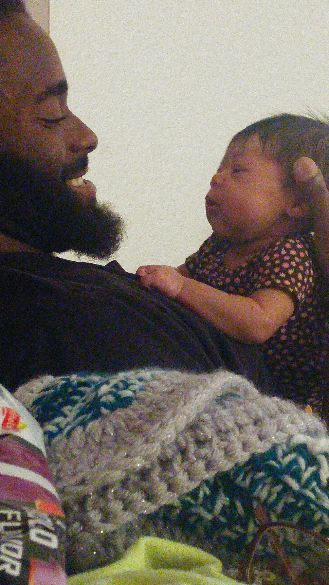 Avyanna joined the competition — help win amazing prizes! facial_hair, fun, girl, human, interaction, person, sitting, textile