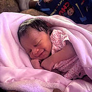 Ramairie joined the competition — help win amazing prizes! baby, blanket, child, cozy, cute, hand, indoors, infant, newborn, pajamas, peaceful, person, pink, portrait, resting, sleeping, smiling, soft, warm, wrapped