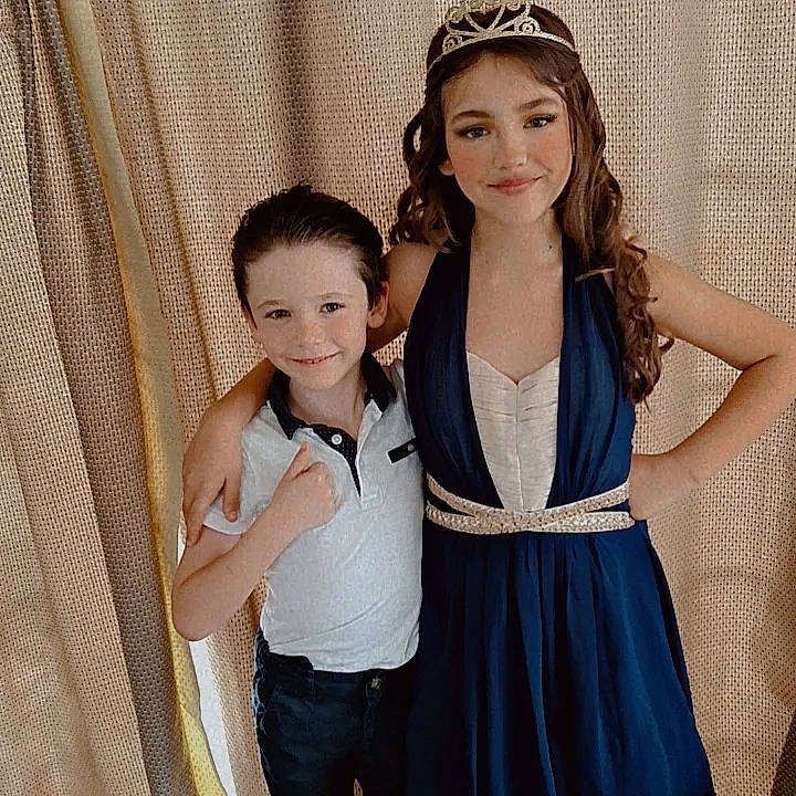 Mia joined the competition — help win amazing prizes! blond, day_dress, event, facial_expression, fashion_design, flash_photography, formal_wear, fun, gesture, hairstyle, happy, headpiece, jewellery, joy, neck, necklace, person, shoulder, sleeve, smile