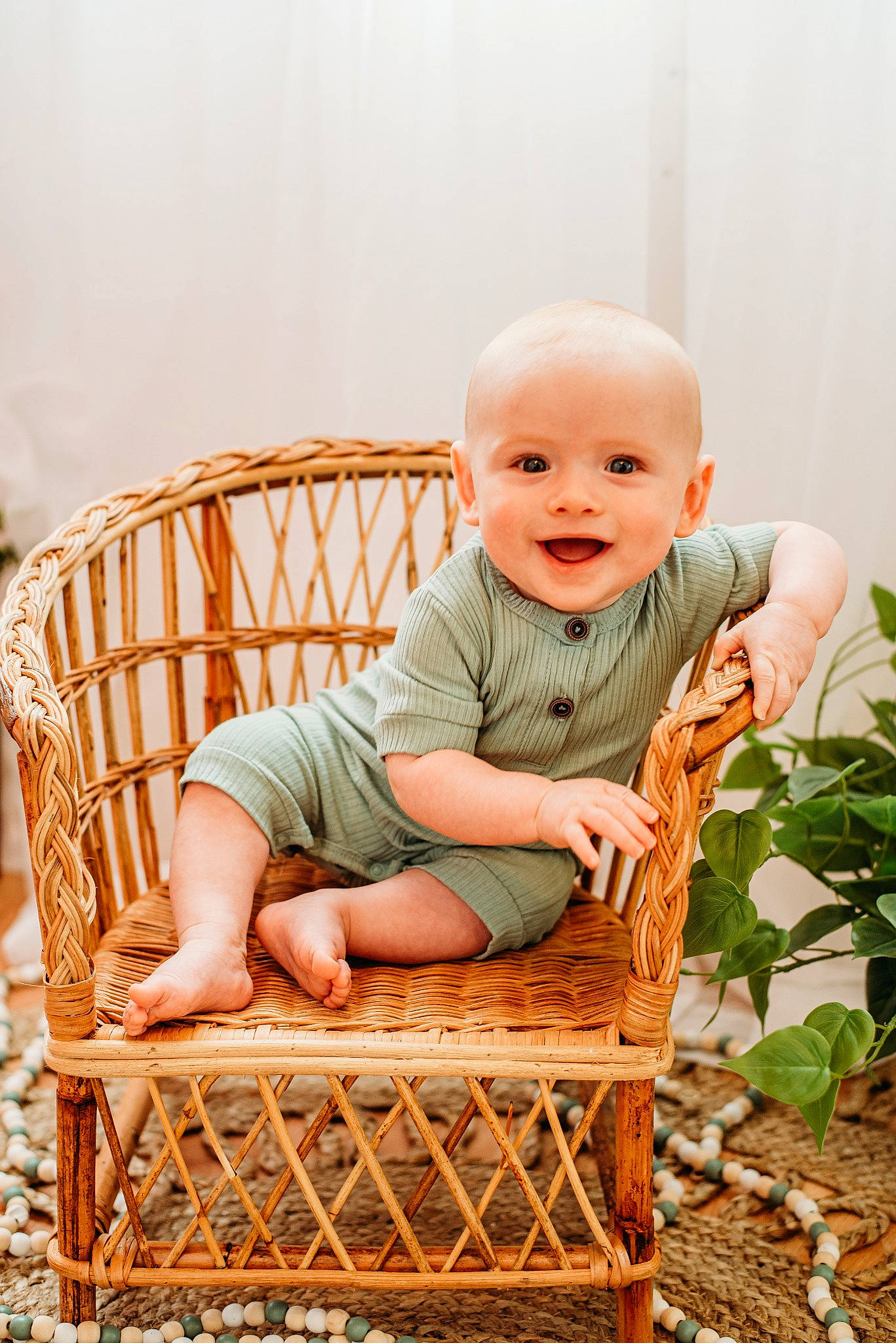 Auggie joined the competition — help win amazing prizes! baby, baby_products, baby_toddler_clothing, chair, child, comfort, face, grass, happy, joy, leg, pattern, person, photograph, plant, product, sitting, skin, smile, toddler