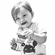 Raziella joined the competition — help win amazing prizes! baby, toddler, child, smiling, food, yogurt, organic, snack, clothing, tshirt, crab, messy_face, happy, holding, portrait, cute, black_and_white, studio, infant, person