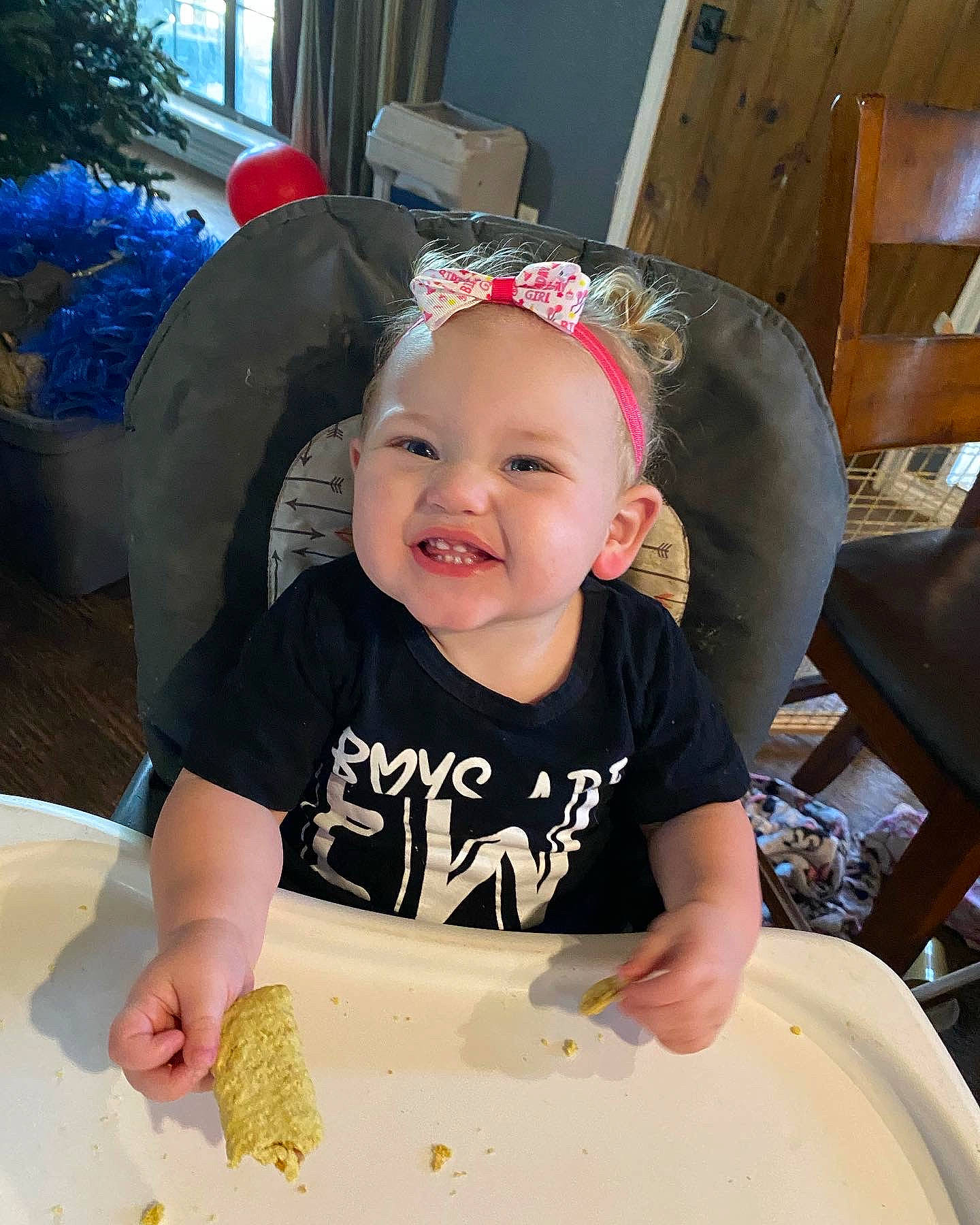Sierra Mathews is registered to the contest to win money with this photo: baby, baby_products, baby_toddler_clothing, cap, chair, child, comfort_food, costume_hat, fashion_accessory, fun, happy, joy, pattern, person, sitting, sleeve, smile, sweetness, t_shirt, tableware